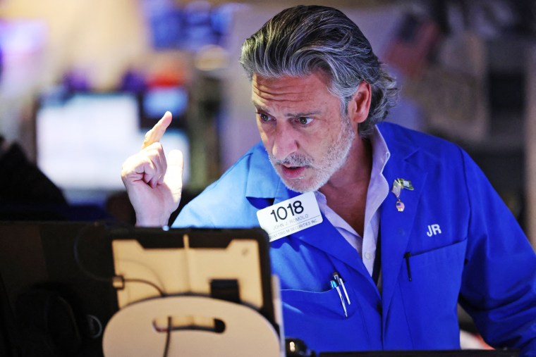 A trader works on the floor of the New York Stock Exchange